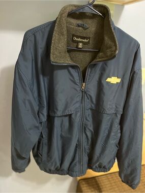 Dunbrooke Dark Blue Puffer Jacket with Yellow Chevron Patch